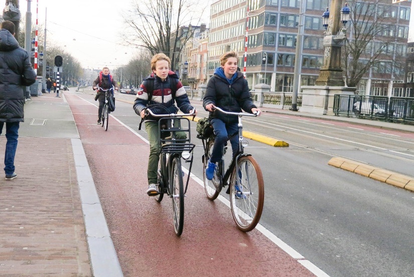 Amsterdam_BikingChildrenOnLane.jpg