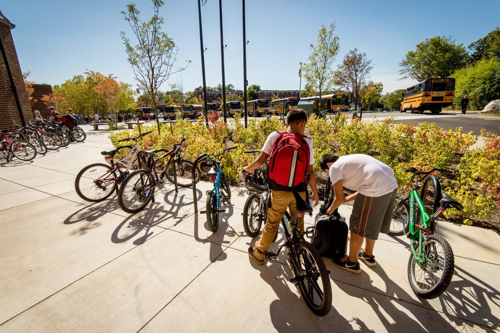 KidsLockingBikesAtSchool.jpg