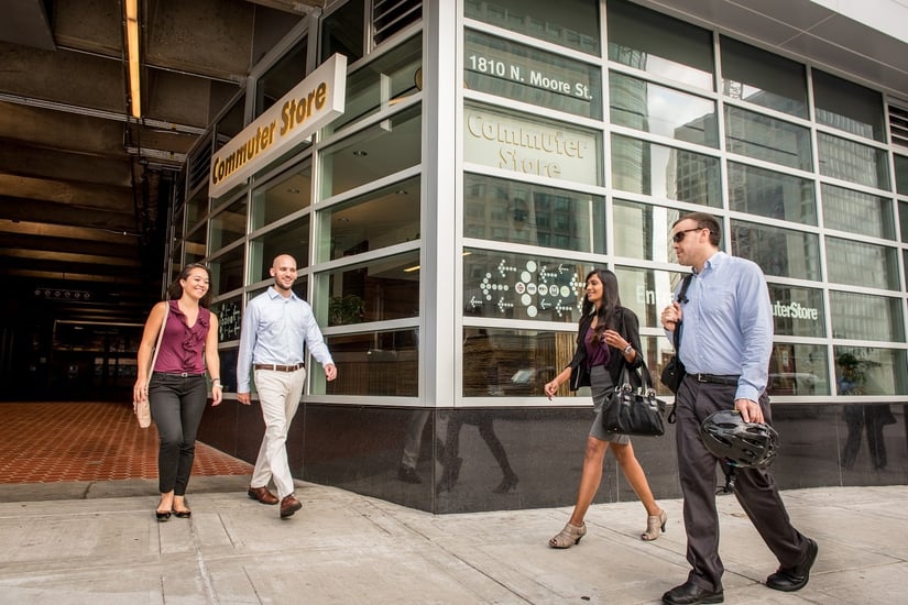 four business people walking near the commuter store in rosslyn, virginia