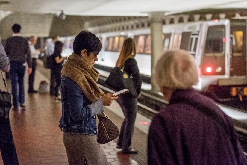 woman-reading-metro-platform.jpg