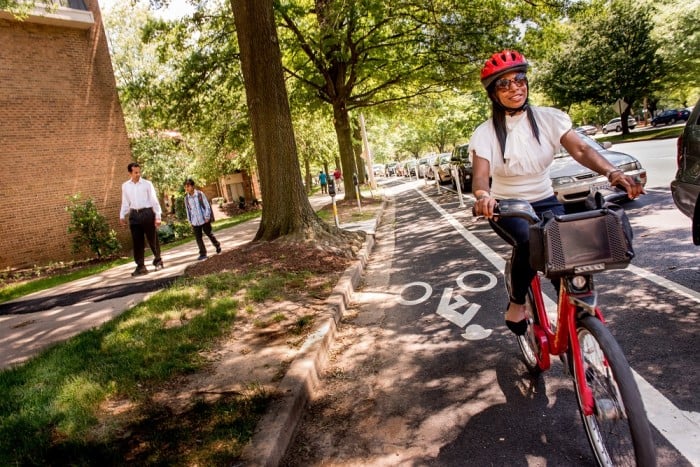 Capital Bikeshare rider in protected lane