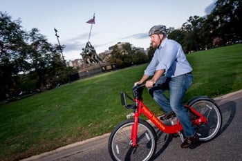 Visitor Services, Capital Bikeshare rider near Iwo Jima Memorial