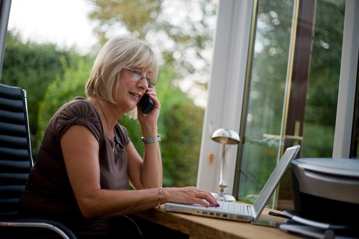 lady-working-from-home-on-phone