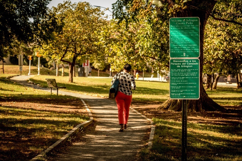 Woman Walking In Park