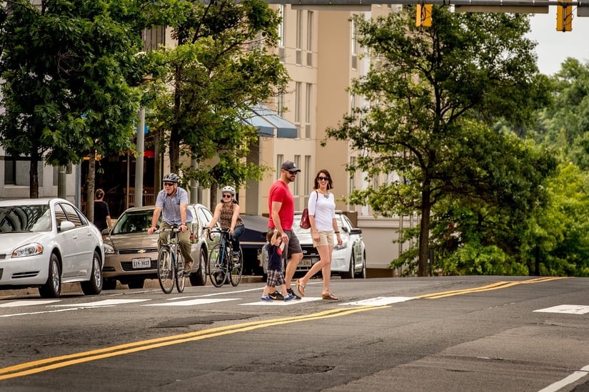 family-walking-courthouse-bikes-too